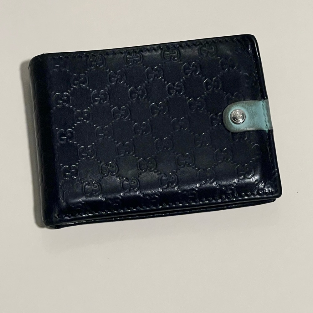 Gucci black leather bi-fold wallet